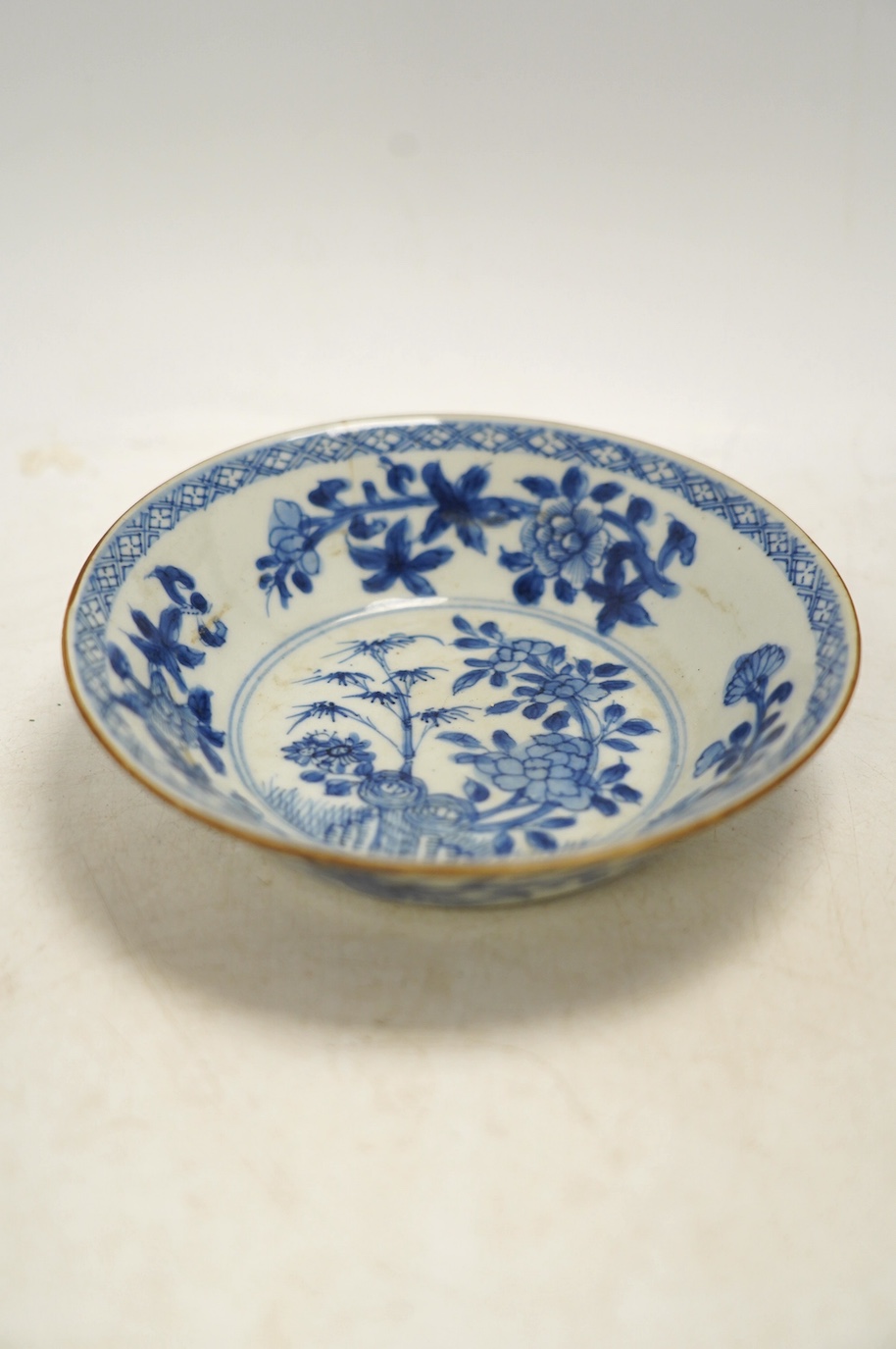 Japanese and Chinese ceramics to include a famille noire vase, a blue and white dish and a Japanese pot and cover, largest 19cm high. Condition - varies